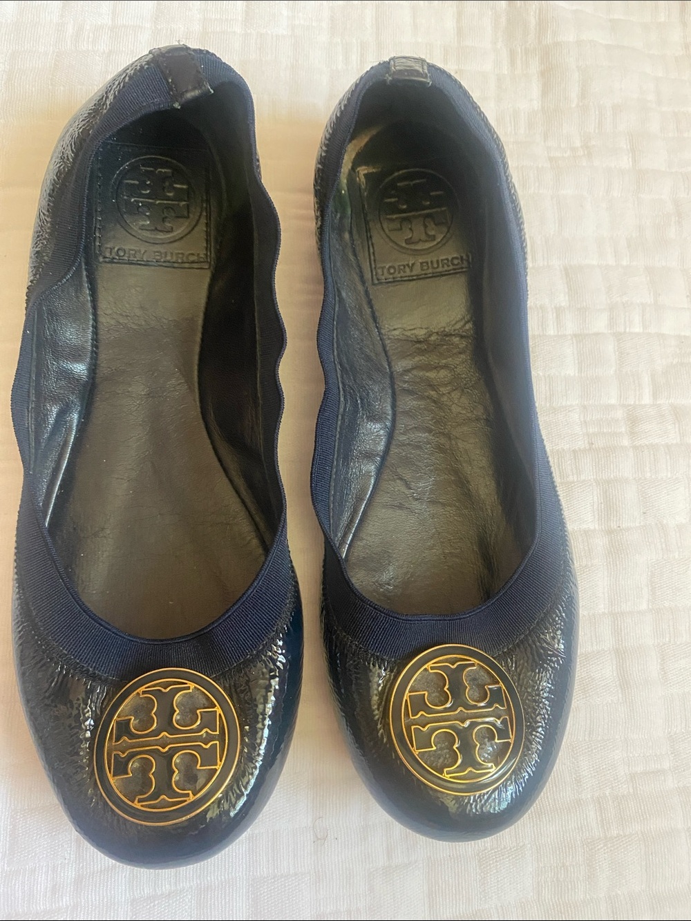 TORY BURCH Navy Patent Logo Ballet Flats with Gold Emblem